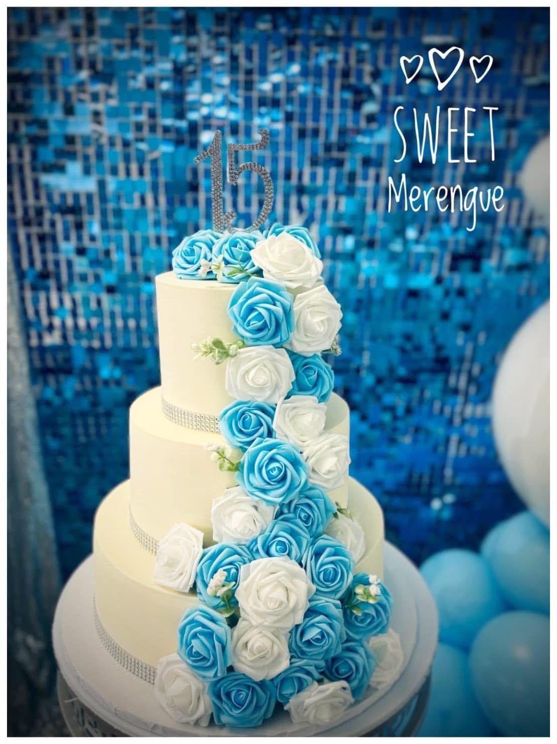 Blue and white tiered celebration cake